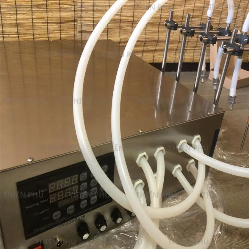 Máy Chiết Rót Dạng Lỏng 8 Vòi Bán Tự Động 19 MAY CHIET ROT DANG LONG 8 VOI BAN TU DONG 2