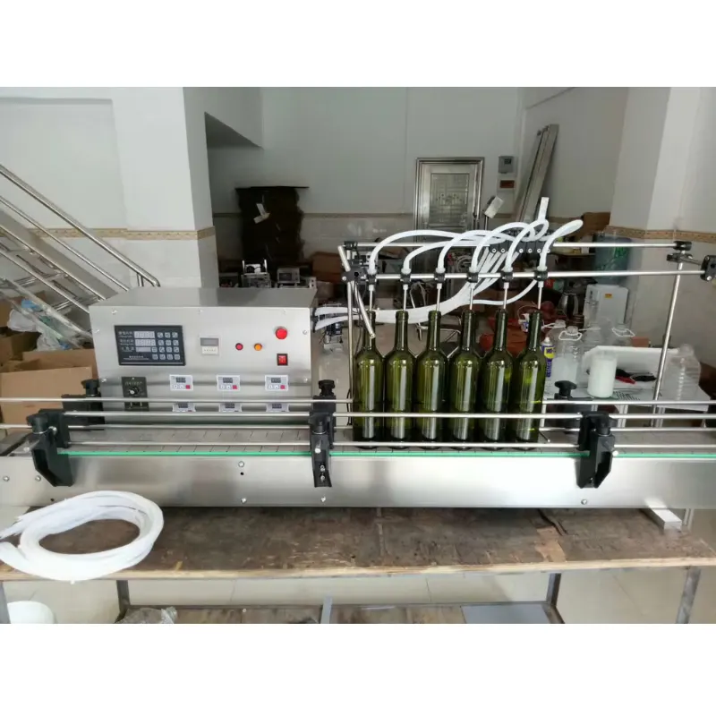 Máy Chiết Rót 6 Vòi Tự Động Mini 3000BPH 19 May chiet rot 6 voi tu dong mini 3000BPH 1